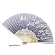 Abanico japonés sensu Cloud lavanda con sakura blanco y una grulla en vuelo Ropa Japonesa