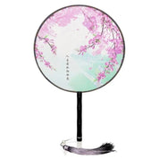 Abanico japonés uchiwa redondo Tahara con sakura rosas y caligrafía poética Ropa Japonesa