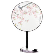 Abanico japonés uchiwa redondo Kiyosu blanco con sakura rosa y un pájaro posado Ropa Japonesa