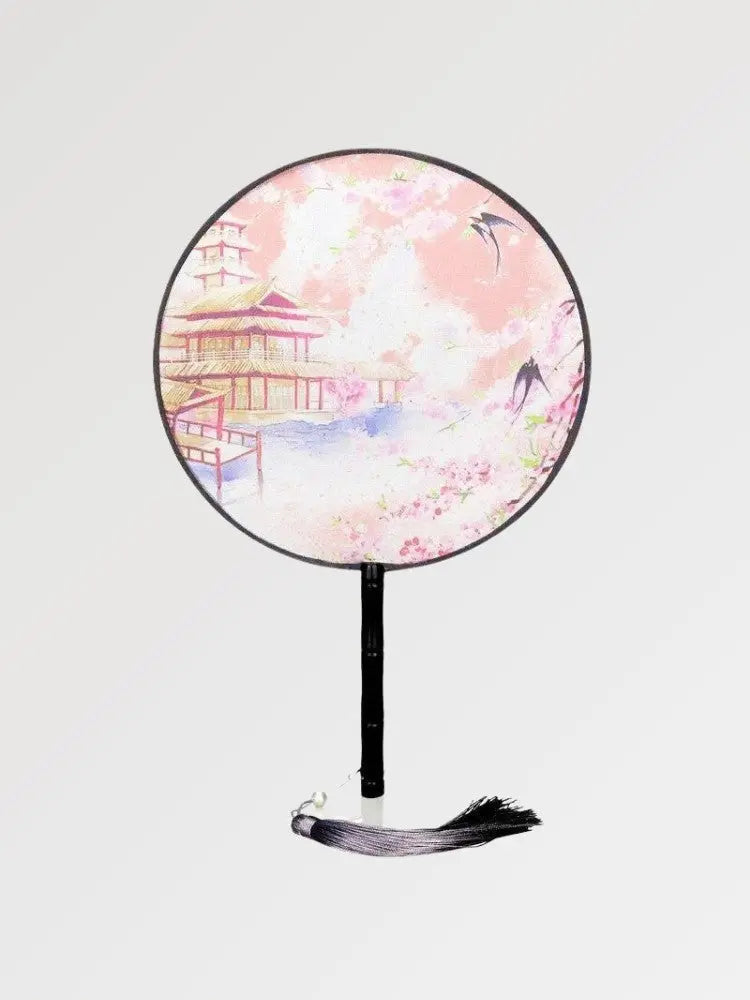 Abanico japonés uchiwa redondo Toyoake rosa con un templo, sakura y golondrinas Ropa Japonesa