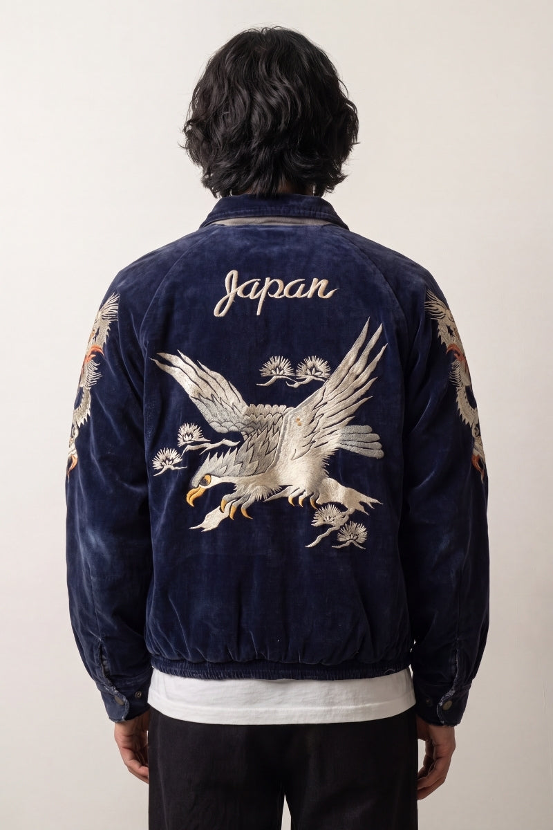 Bomber de ante azul profundo bordado con un dragón japonés