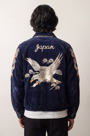 Bomber de ante azul profundo bordado con un dragón japonés