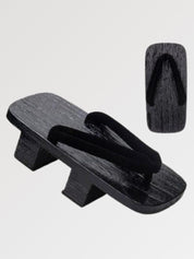 Geta japonesa Hekinan con hanao negro liso sobre madera negra yakisugi Ropa Japonesa