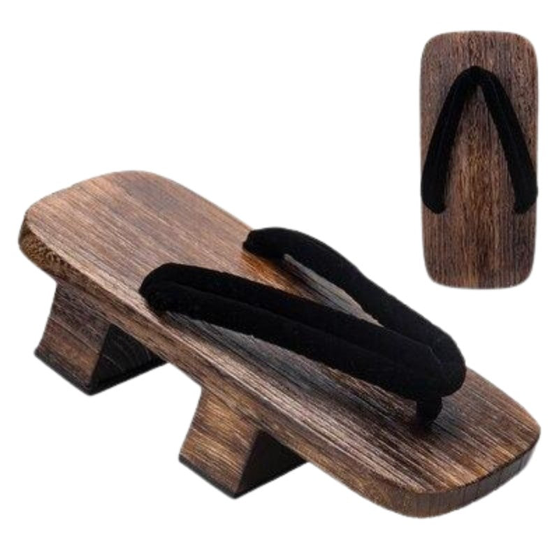 Geta japonesa Iwakura con hanao negro liso minimalista sobre madera marrón Ropa Japonesa