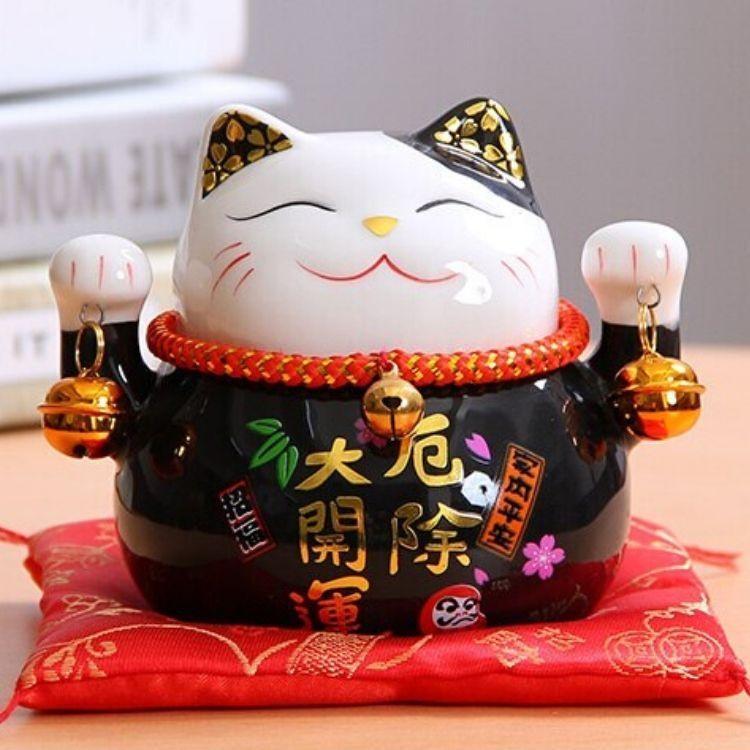 Hucha maneki-neko Negro con caligrafía dorada de protección de porcelana esmaltada Ropa Japonesa