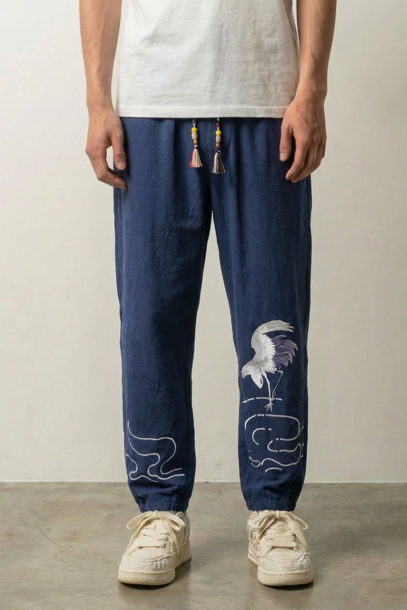 Pantalón japonés Tsuru rojo burdeos con bordado de grulla blanca en la pantorrilla Ropa Japonesa