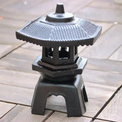 Pequeña linterna japonesa tōrō Abiko de hierro fundido negro con pátina Ropa Japonesa