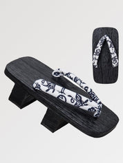 Geta japonesa Utsomita con hanao de mariposas sobre madera negra yakisugi Ropa Japonesa