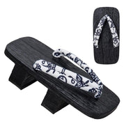Geta japonesa Utsomita con hanao de mariposas sobre madera negra yakisugi Ropa Japonesa